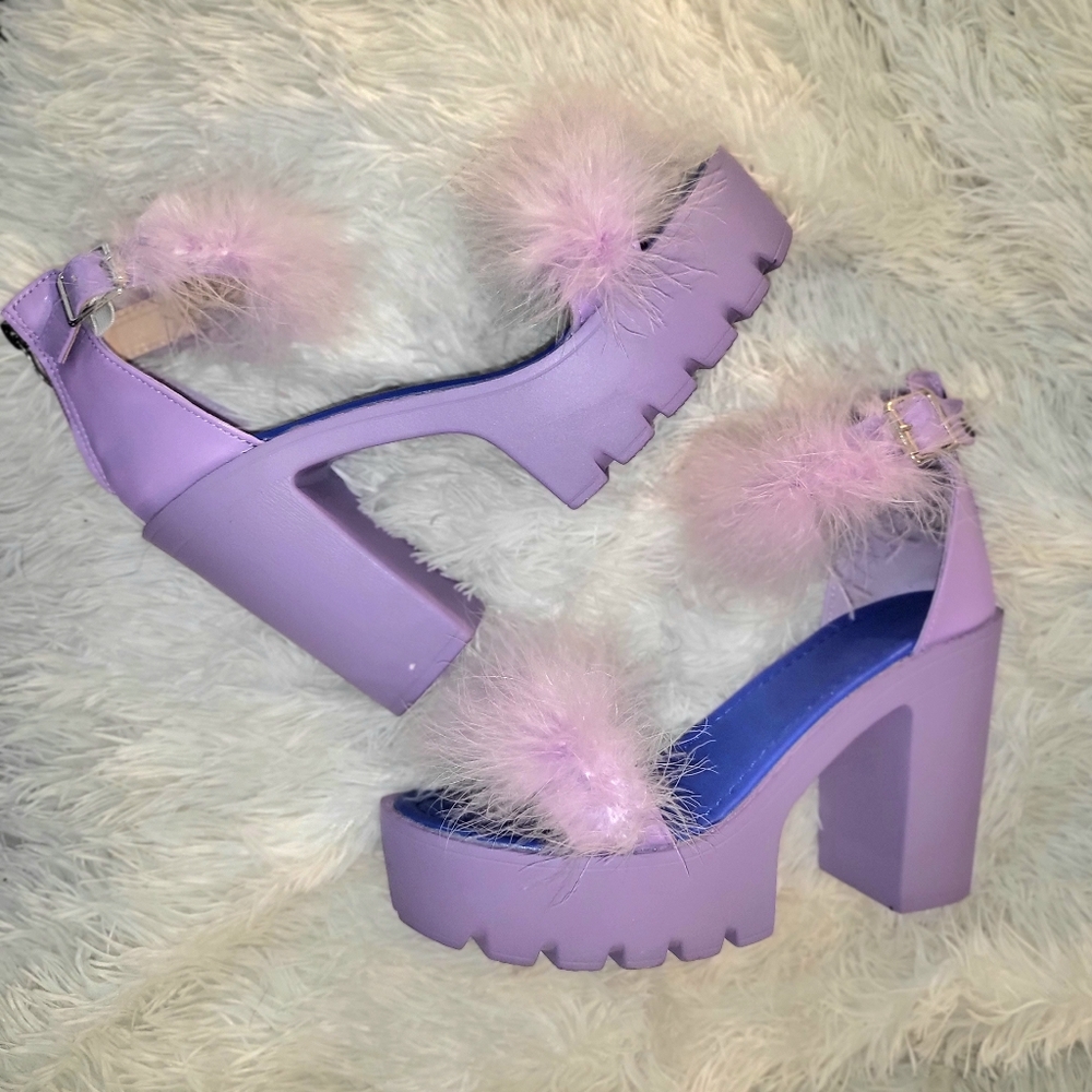 Purple platform kitten heels with feather accents